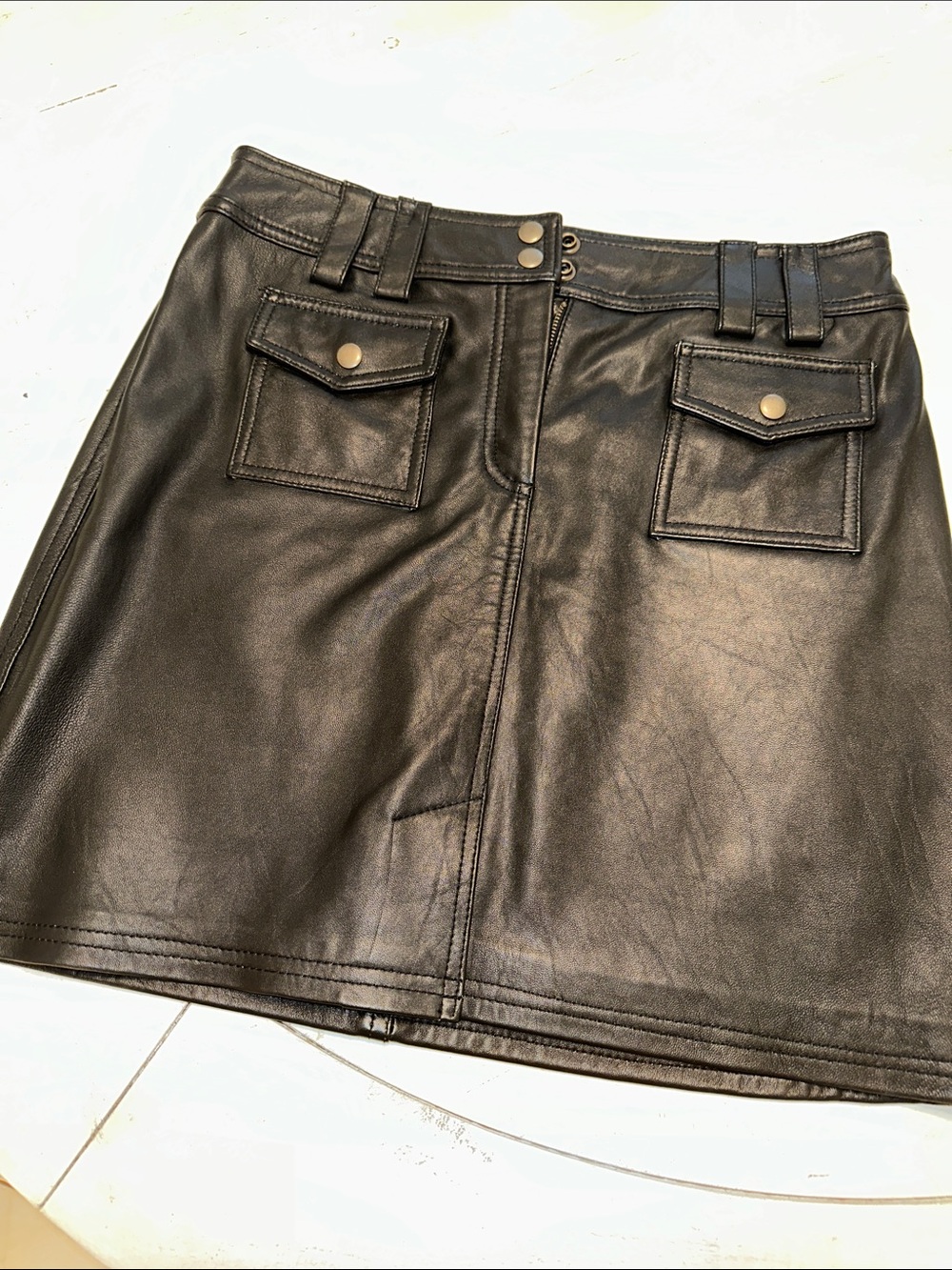 Vintage 90’s Black real Leather Mini Skirt with Front Flap Pockets
